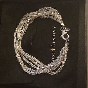 Ross simons sterling silver bracelet.   Never worn.  With box.